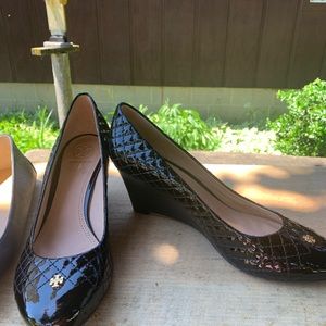 Tory Burch black patent leather wedges.